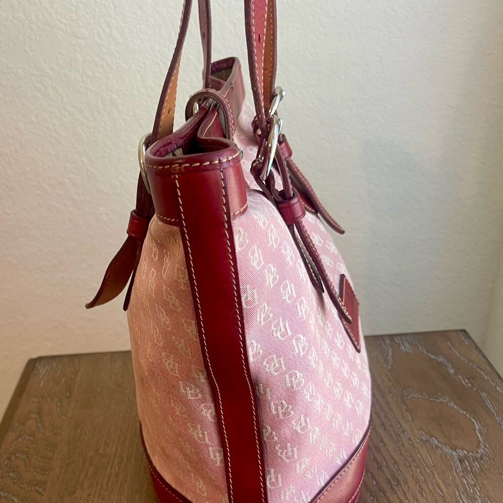 Dooney & Bourke Pink and Red Shoulder Bag
Size 10”L x 10”W x 5.5 - Picture 6 of 11